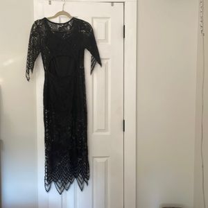 Black lace with black slip underneath open back